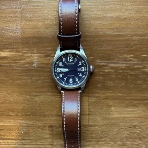 Citizen Eco-drive watch. Blue face. Brown leather band. 44mm.